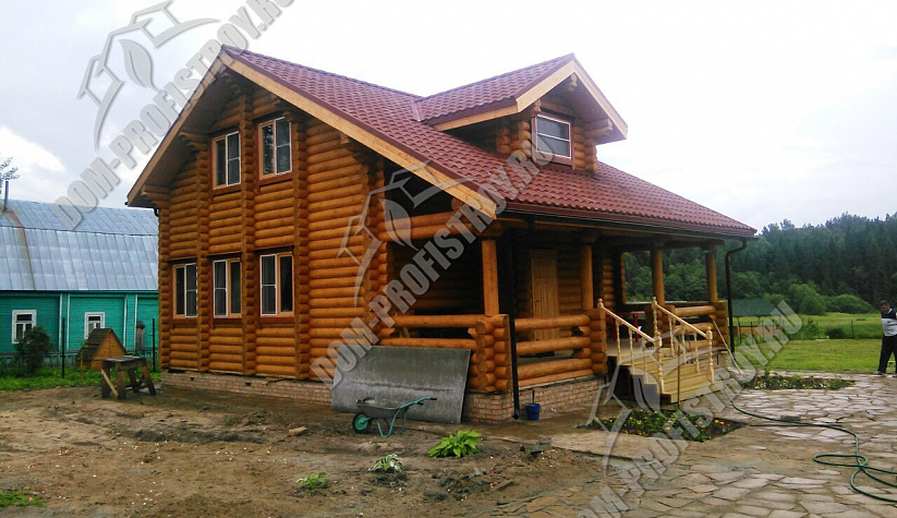 Дом из оцилиндрованного бревна в деревне Дор, Рыбинский район, внешняя отделка